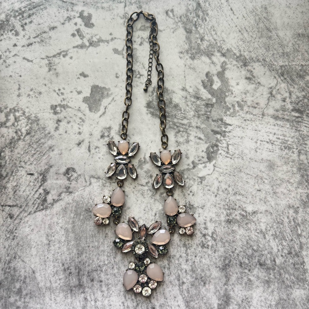Pink and Silver Necklace with Intricate Pendant and Gemstones
